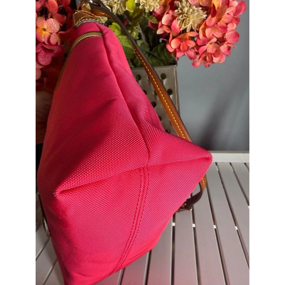 Genuine Dooney and Bourke Zip Crossbody Bag in Hot Pink MSRP $218.00 like new